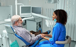 Patient interacting with dental team member