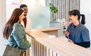Patients interacting with dental team member