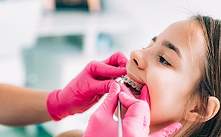 Girl at the dentist with braces