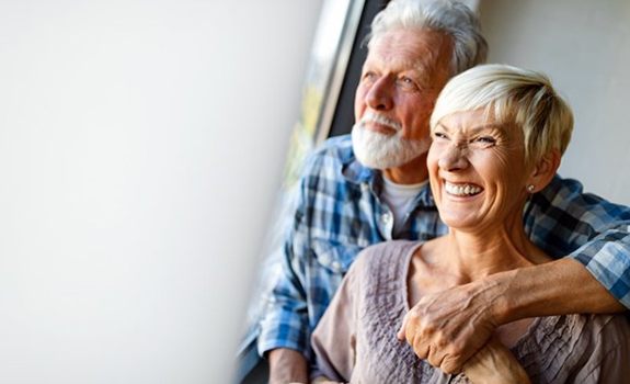 Smiling couple with dentures in Lakewood