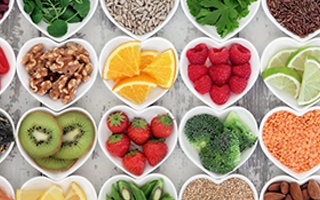 Collection of foods distributed in heart-shaped bowls