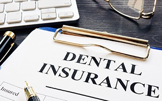 dental insurance form on table