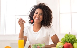 woman eating a salad