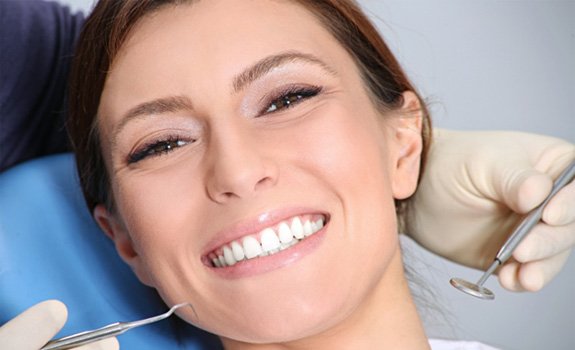 Patient sitting in a dental chair 