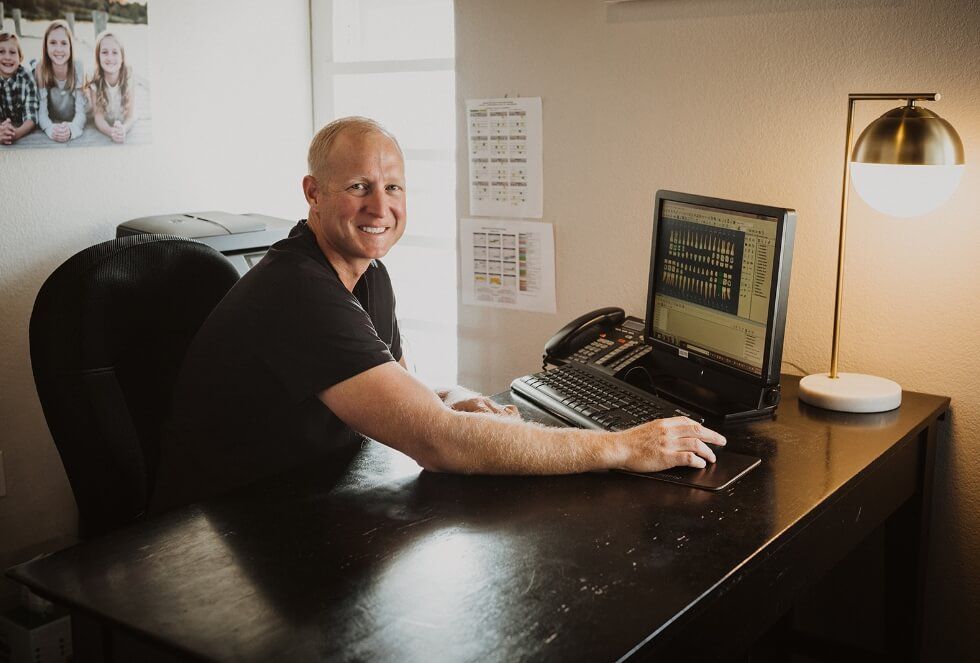 Doctor Spillman smiling in his consultation room