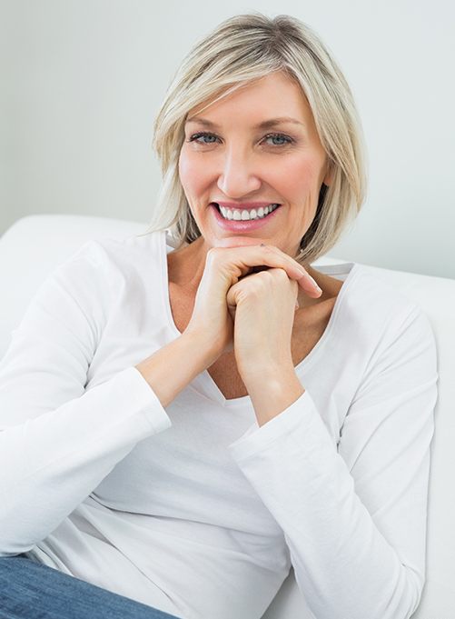 Woman sharing smile after periodontal therapy