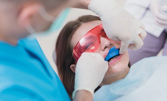 Child receiving fluoride treatment