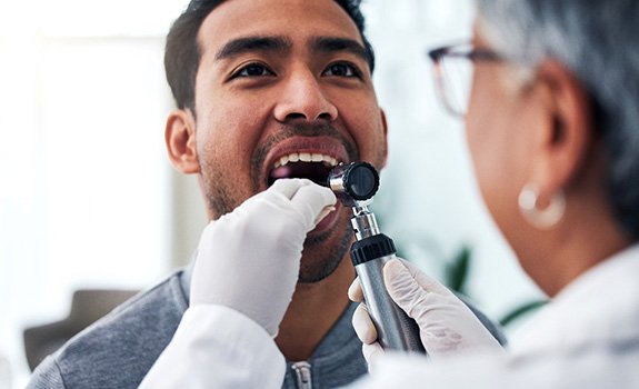 Your dentist will check your mouth, head, and neck for abnormalities that could indicate oral cancer