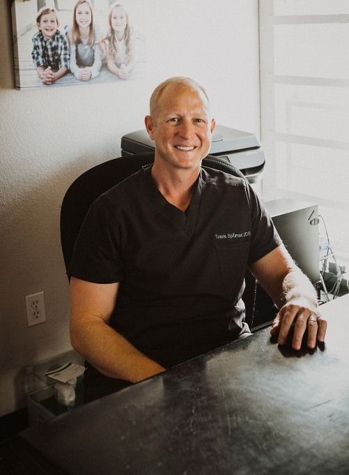 Doctor Spillman in dental office consultation room