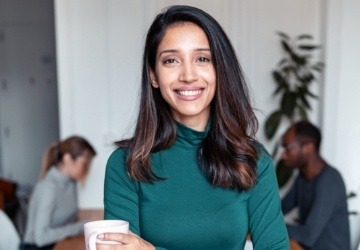 Woman smiling after cosmetic dentistry