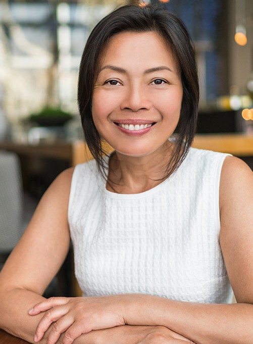 Woman with healthy smile at the dental office