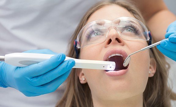 Dentist capturing intraoral images