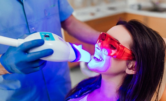 woman getting teeth whitening in Dallas
