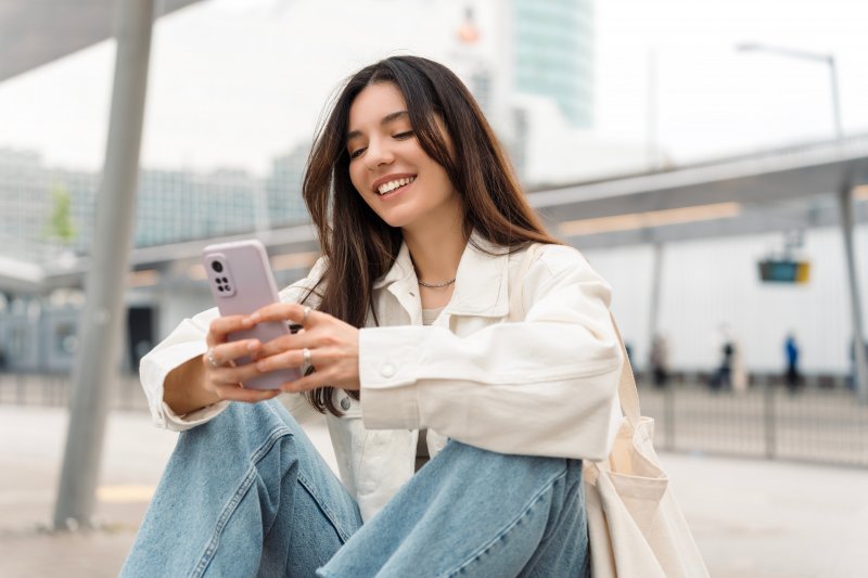 Lady reads something on phone